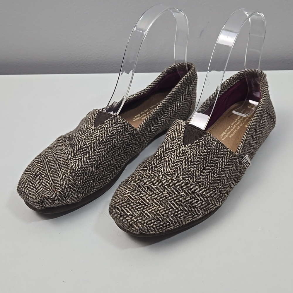 Toms brown and white with gold specks slip on shoes